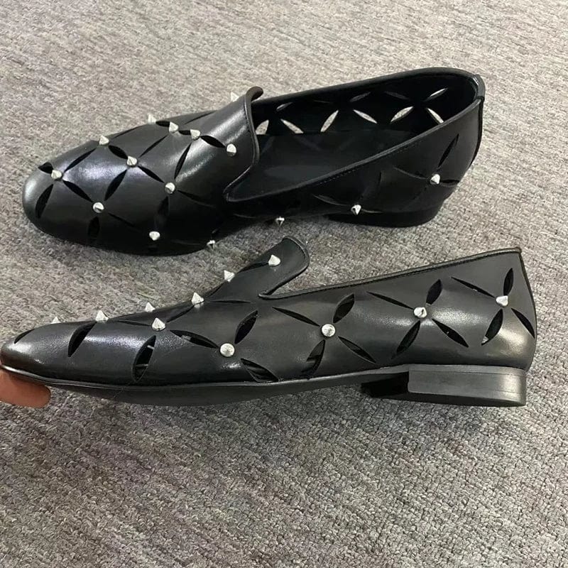Black LOUBUTEN men's spiked cowhide leather loafers with hollow-out design, breathable and stylish for casual or business wear.