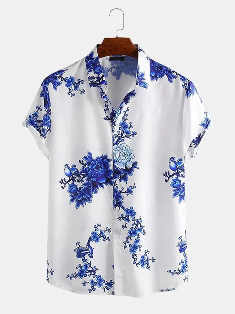 Stylish men's plum blossom ink print short sleeve lapel shirt by Showlu Fashion, featuring a vibrant floral design on lightweight fabric.