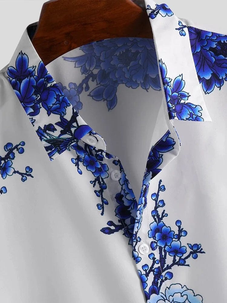 Stylish men's short sleeve lapel shirt with plum blossom ink print by Showlu Fashion, featuring a vibrant floral design.