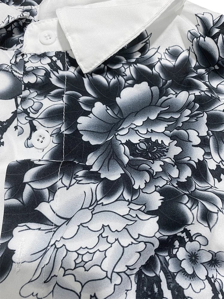 Stylish men's short sleeve lapel shirt by Showlu Fashion with plum blossom ink print, casual and contemporary design.