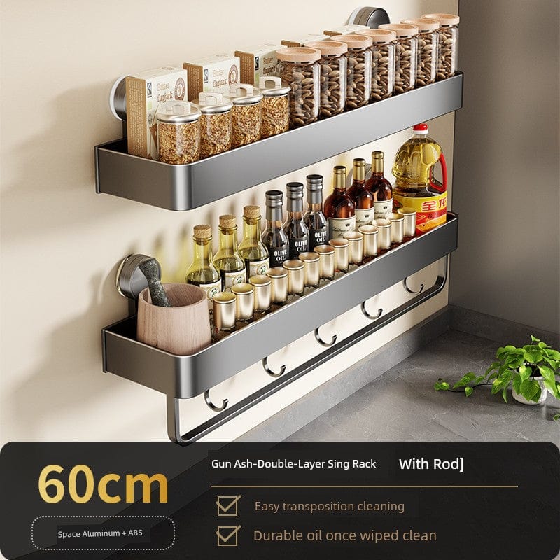 SHOWLU Space aluminum suction cup wall hook rack with multiple hooks for kitchen condiment organization and storage.