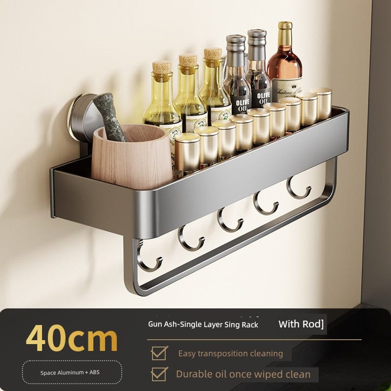 SHOWLU Space Aluminum Suction Cup Wall Condiment Hook Rack Organizer mounted on kitchen wall with multiple hooks for utensils and condiments.