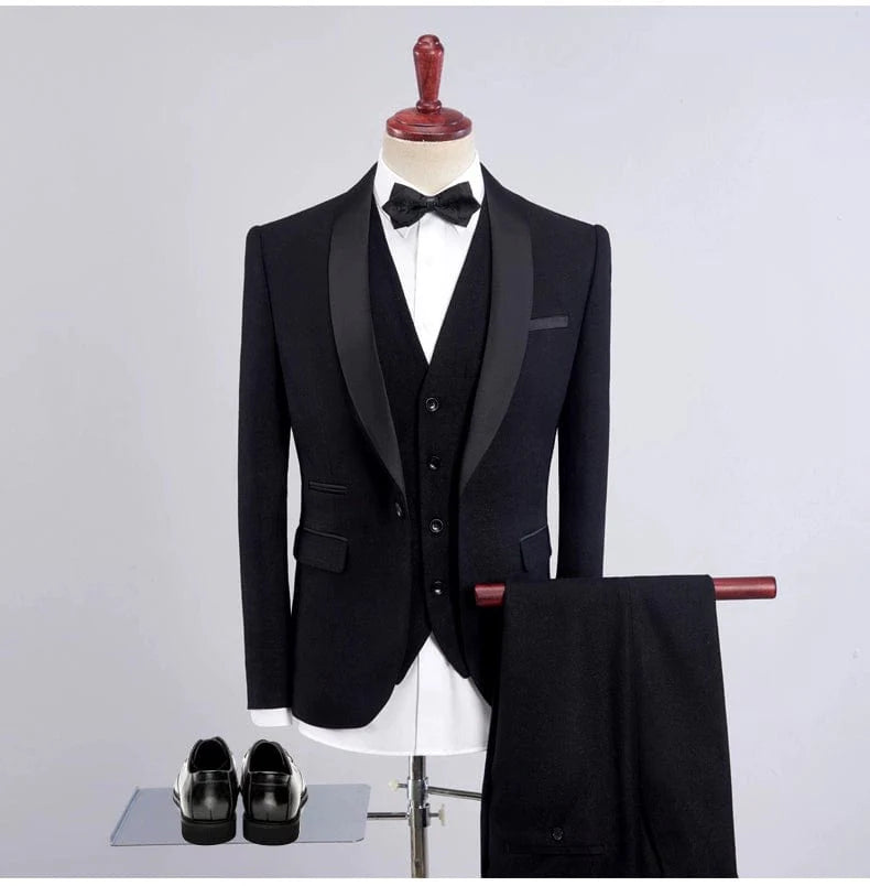 Men's slim fit three-piece business suit with shawl collar, black tuxedo style, tailored for a sharp, professional look.