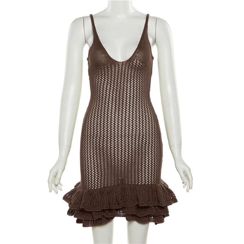 Knee-length Showlu Fashion sultry knitted cut-out sling dress with stylish open back and fitted silhouette on a model.