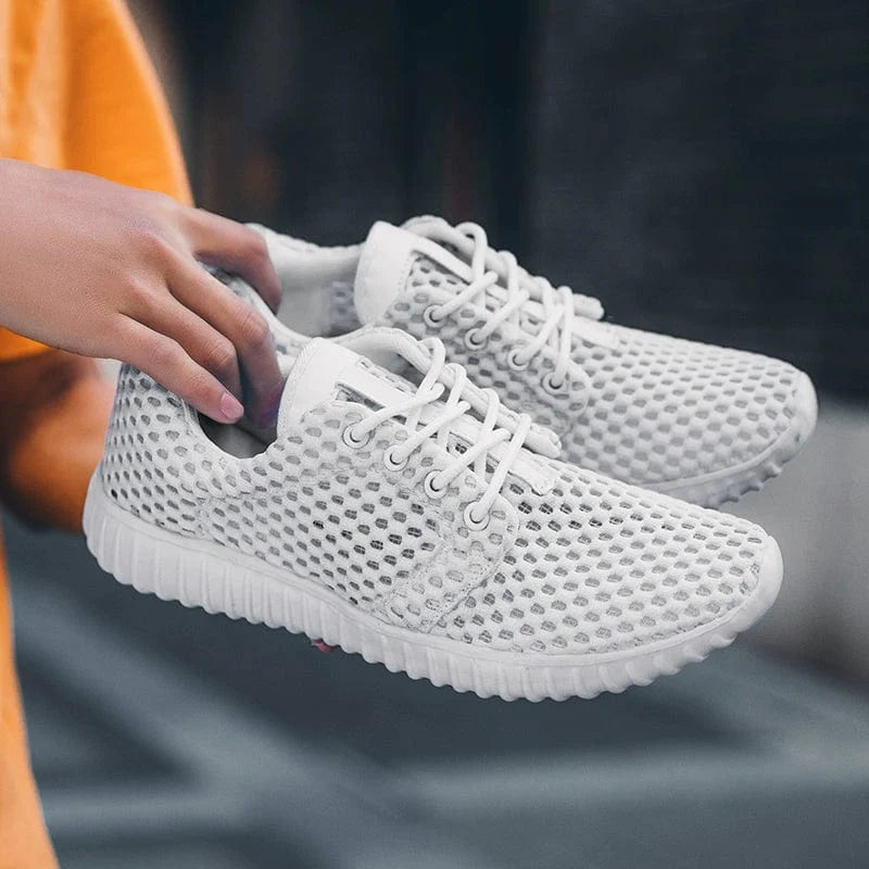 SHOWLU breathable casual shoes with shock absorption for middle school students, ideal for summer comfort and everyday wear.