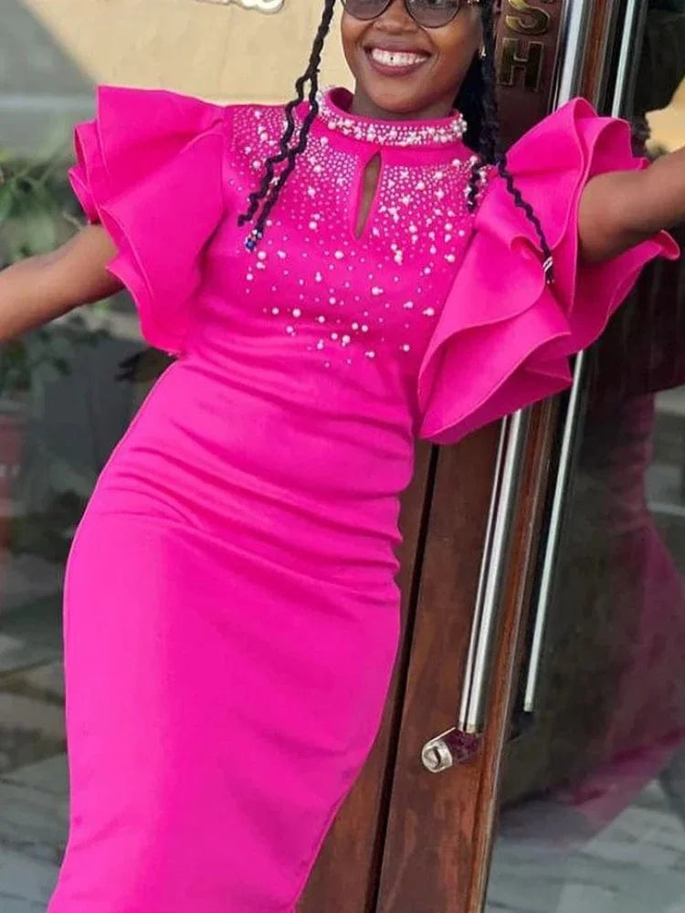 A red rhinestone mini party dress with high neckline, ruffled details, and slim fit, perfect for summer evening events.