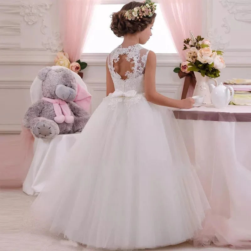 Girls white lace floral ball gown for formal weddings and parties, featuring a princess style dress with elegant details.