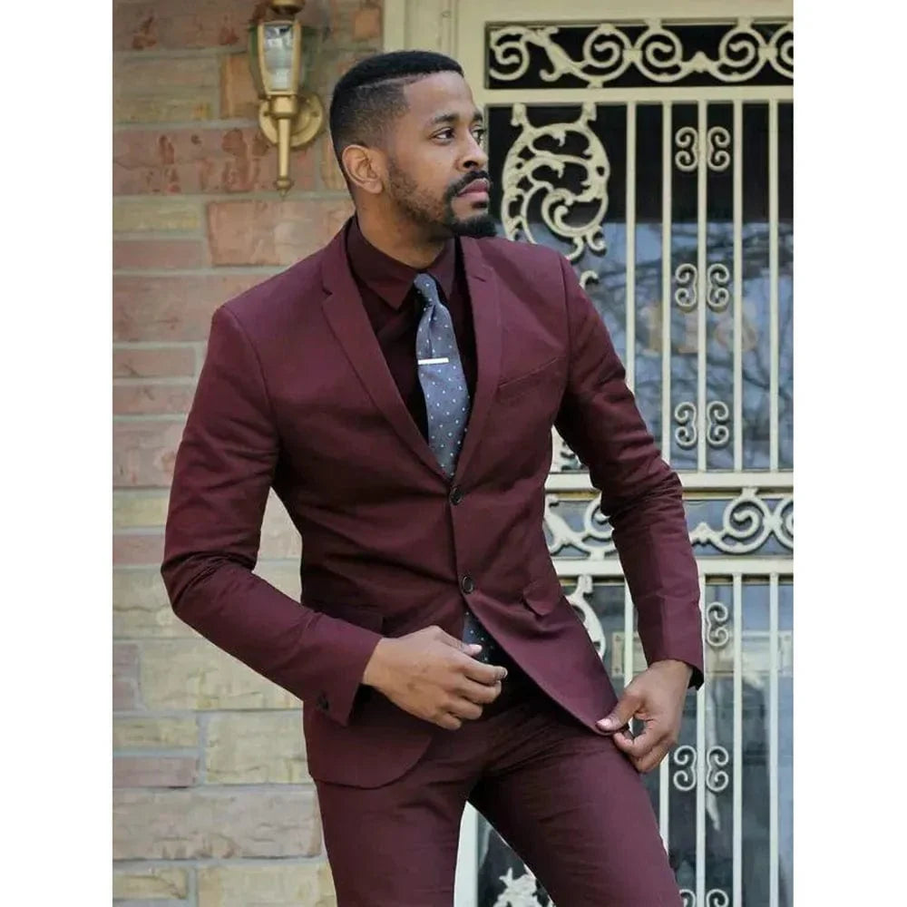 Men's burgundy slim fit two-piece suit with notch lapel, suitable for formal, office, or wedding occasions.