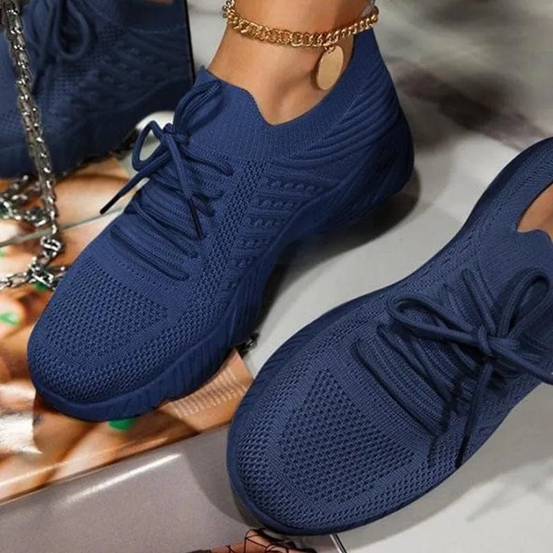 Showlu Women's Mesh Breathable Platform Sneakers with casual lace-up design and vulcanized sole, ideal for summer and sports.