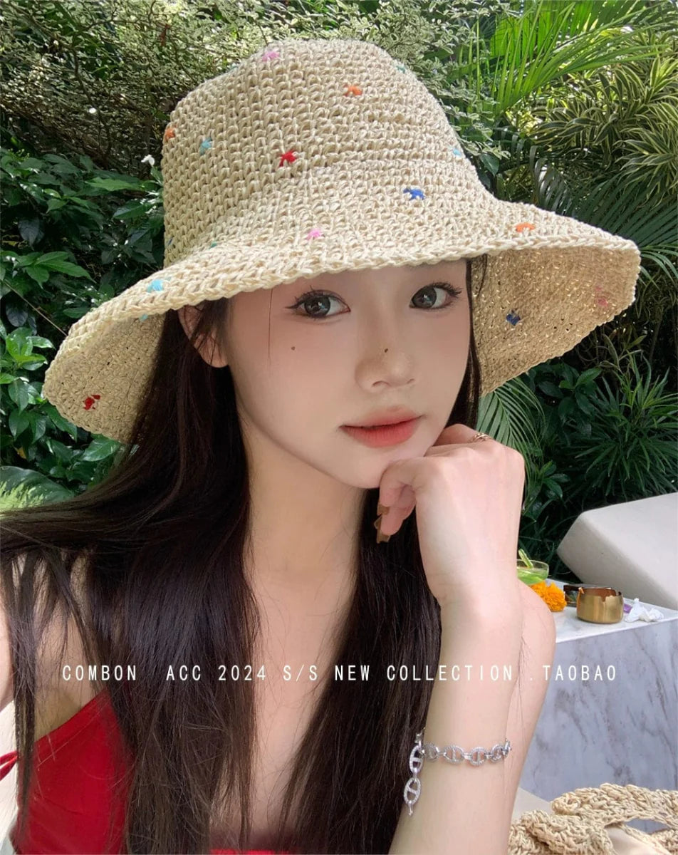Showlu Fashion women's wide brim straw sun hat with a bow, perfect for summer outdoor sun protection and stylish summer wear.