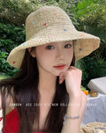 Showlu Fashion women's wide brim straw sun hat with a bow, perfect for summer outdoor sun protection and stylish summer wear.