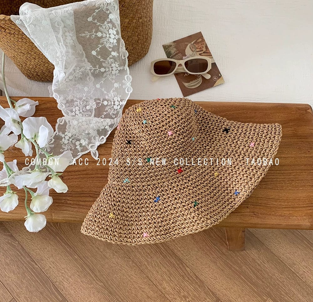 Showlu Fashion women's wide brim straw sun hat with a bow, perfect for summer outdoor wear and sun protection.