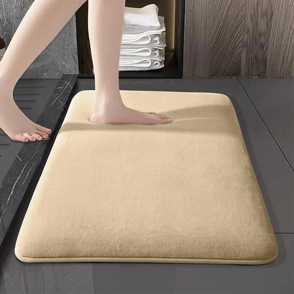 Super absorbent coral velvet bath mat with anti-slip backing, ideal for bathroom flooring, by Showlu Fashion.