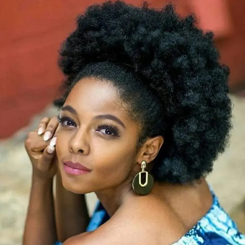 SHOWLU FASHION 10-inch Afro Puff drawstring ponytail extension with kinky curly synthetic hair for Black women, styled as a hair bun.