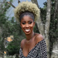 SHOWLU FASHION 10-inch Afro Puff drawstring ponytail extension with kinky curly hair for black women, styled as a big synthetic hair bun.