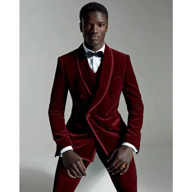 Burgundy velvet men's 3-piece slim fit tuxedo suit with blazer, vest, and pants, ideal for weddings, prom, or formal events.