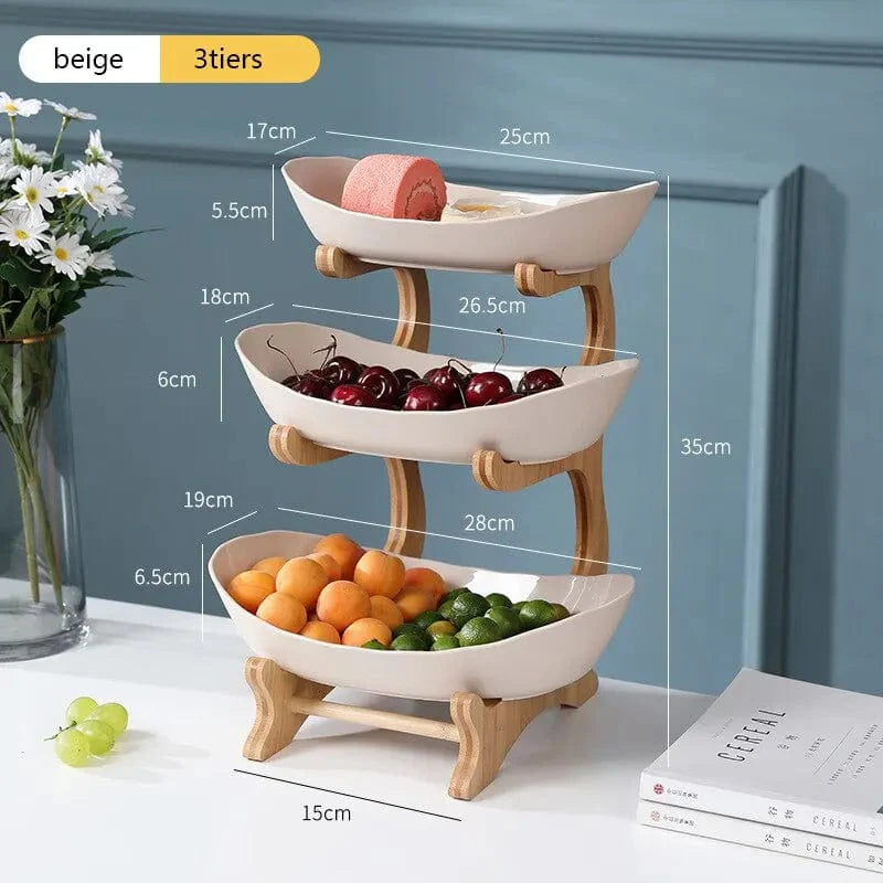 Showlu Wooden Style Oval Fruit Plates and Partitioned Candy Cake Trays on a kitchen table for serving fruits and desserts.