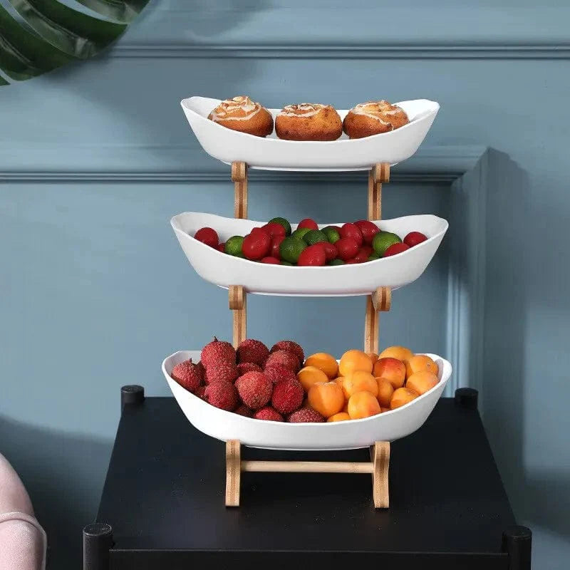 Showlu Wooden Style Oval Fruit Plates and partitioned candy cake trays on a wooden table, ideal for serving fruits and desserts.