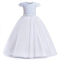 White sequin princess gown for girls by Showlu Fashion, elegant formal dress with long skirt and shimmering sequins for special occasions