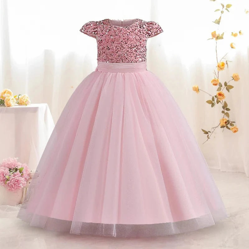 Teenage girl wearing Showlu Fashion's white sequin princess gown, an elegant long formal dress for parties, weddings, and prom.