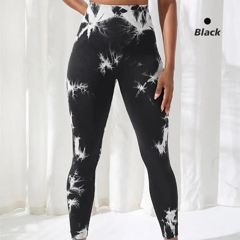 Showlu Tie Dye Seamless Leggings for women, high waist yoga pants with scrunch butt, elastic fit, and vibrant tie-dye pattern.