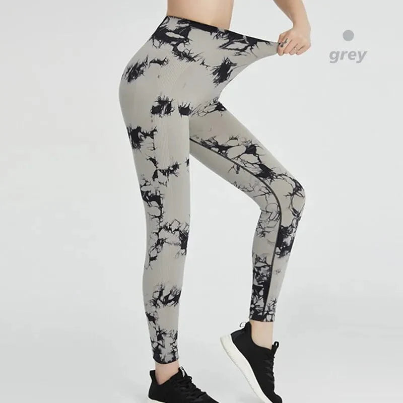 Showlu Tie Dye Seamless Leggings for women, high waist yoga pants with scrunch butt design and elastic fabric for comfort.