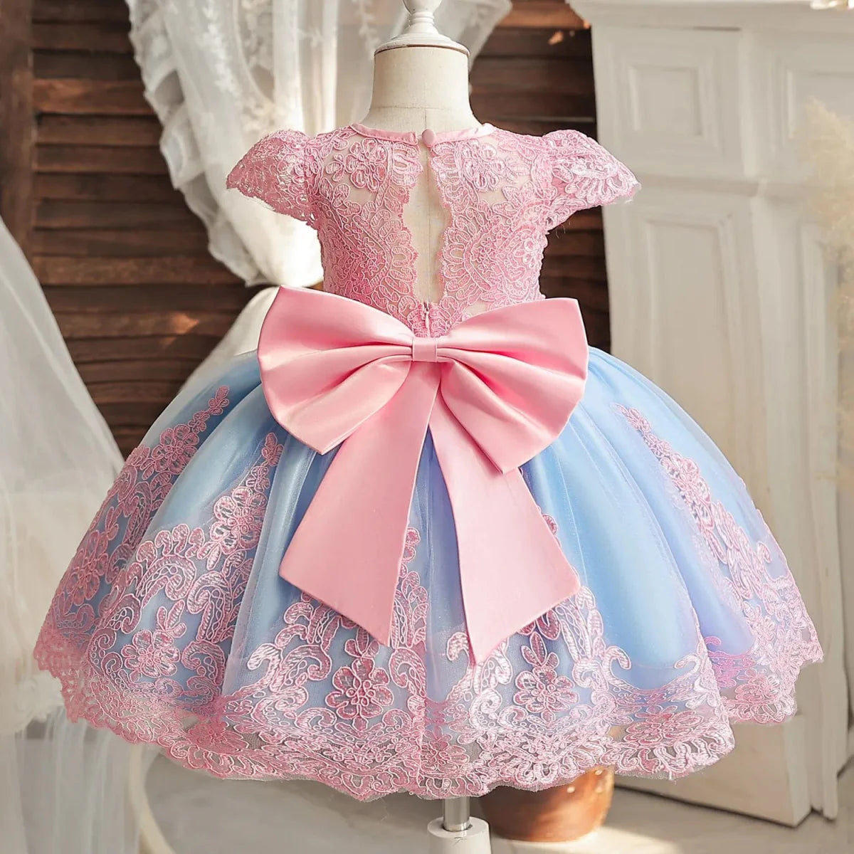 Toddler girl in white lace embroidery beading dress for 1st birthday or baptism, featuring a princess-style design with luxurious details.