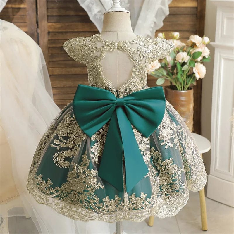 Toddler girl in white lace embroidery beading birthday dress with princess style for baptism or first birthday celebration.