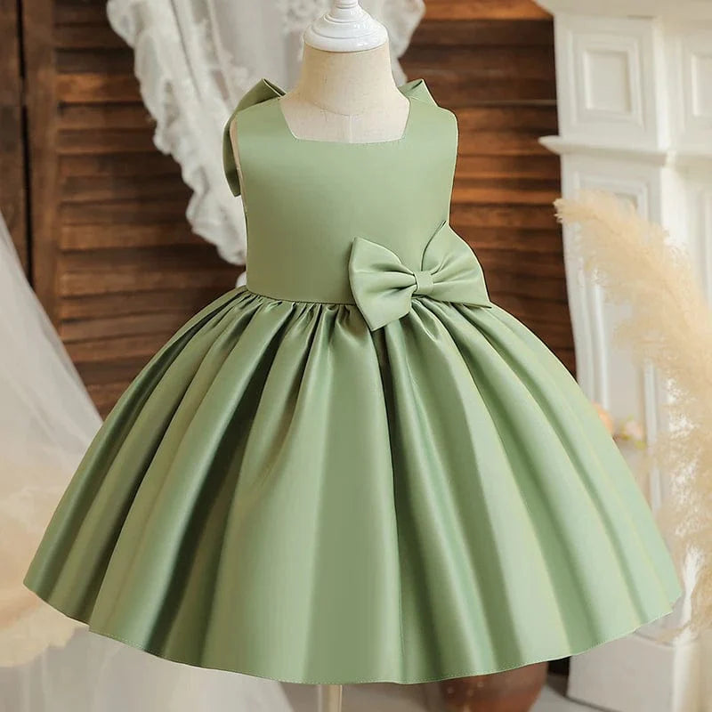 Toddler girl in a white baptism dress with a big bow, perfect for princess parties, baptisms, or weddings, by SHOWLU FASHION STORE.