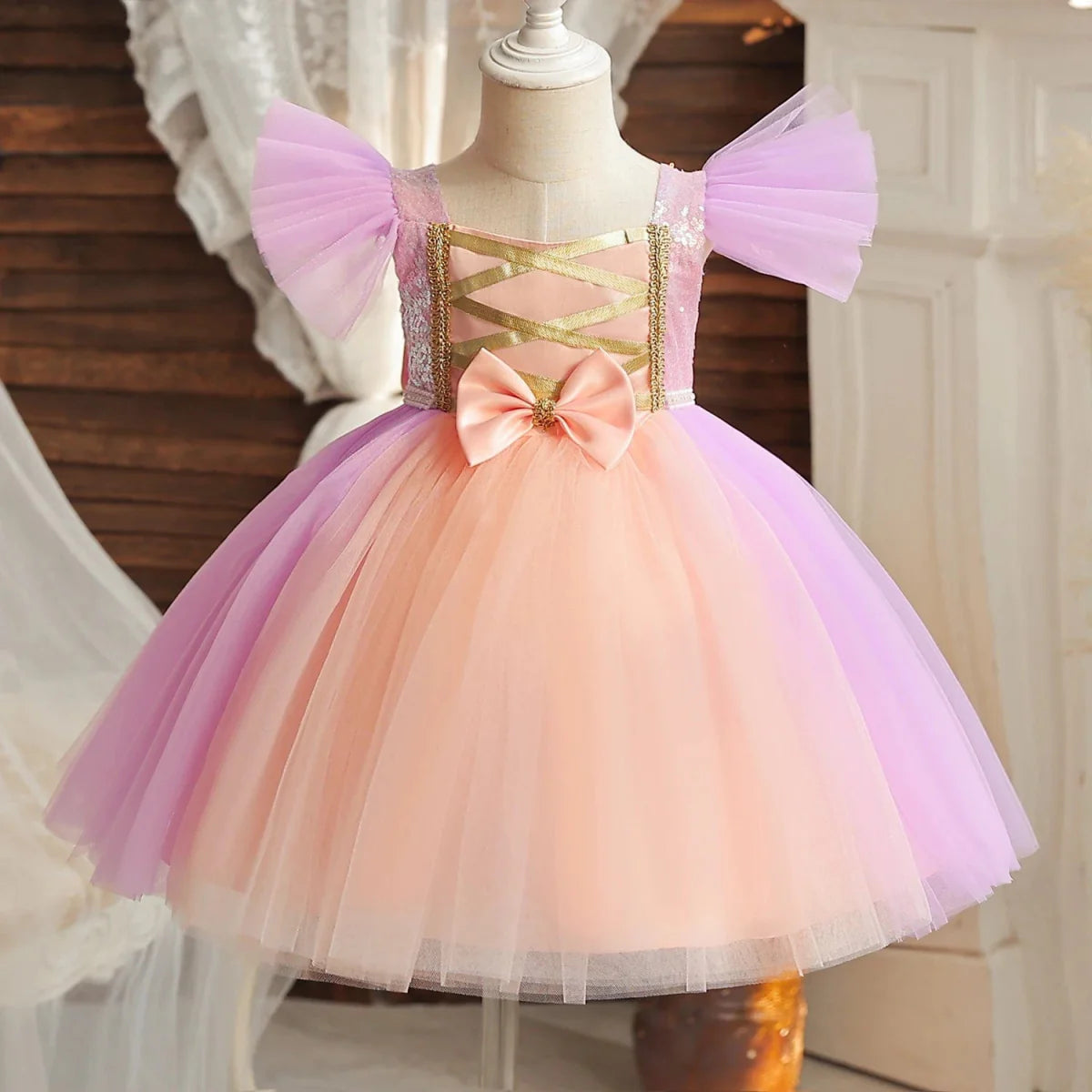 Toddler girl blue beaded tutu gown with V-back and bow, perfect for birthday parties, made of tulle for little girls aged 1-5 years.