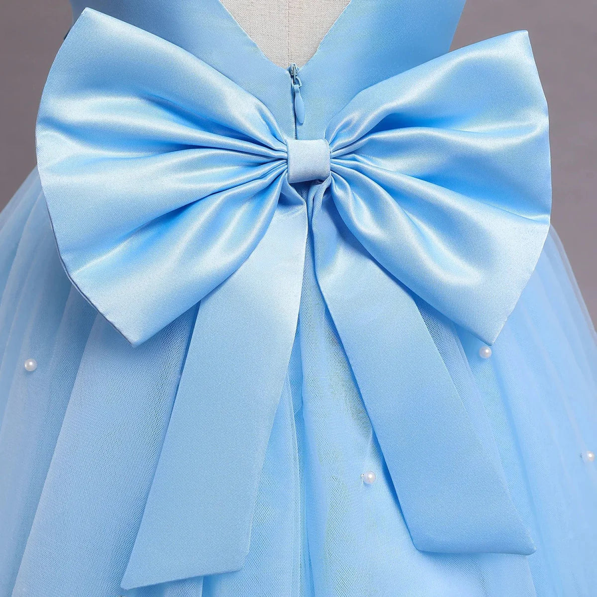 Toddler girl blue beaded tutu gown with V-back and bow, perfect for birthday parties, made of tulle, by Showlu Fashion Store.