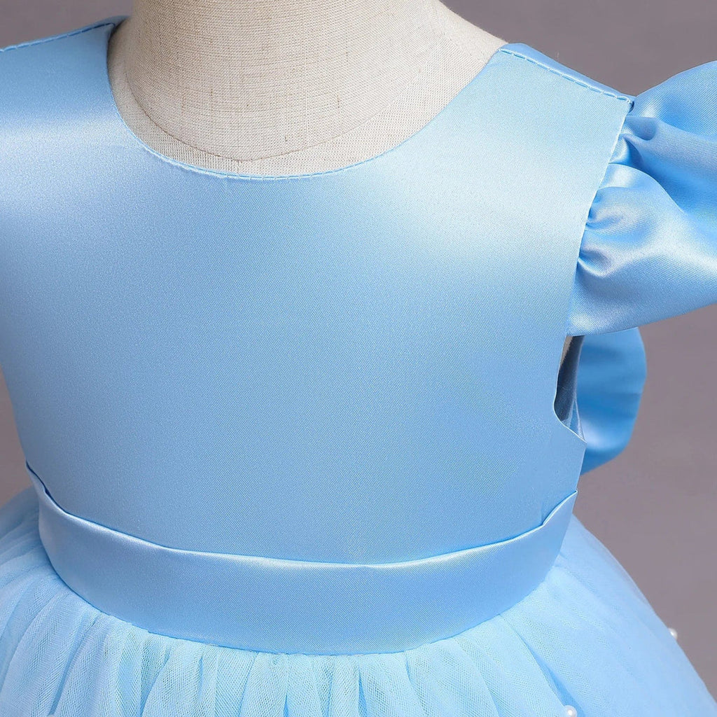 Toddler girl blue beaded tutu gown with V-back and bow, suitable for birthdays or special occasions, made of tulle and soft fabric.