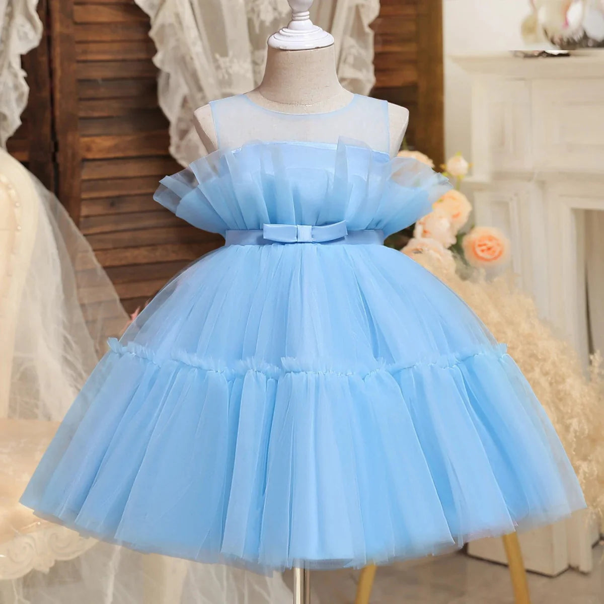 Toddler girl blue beaded tutu gown with V-back and bow, perfect for birthday parties, made of tulle for infants 1-5 years.