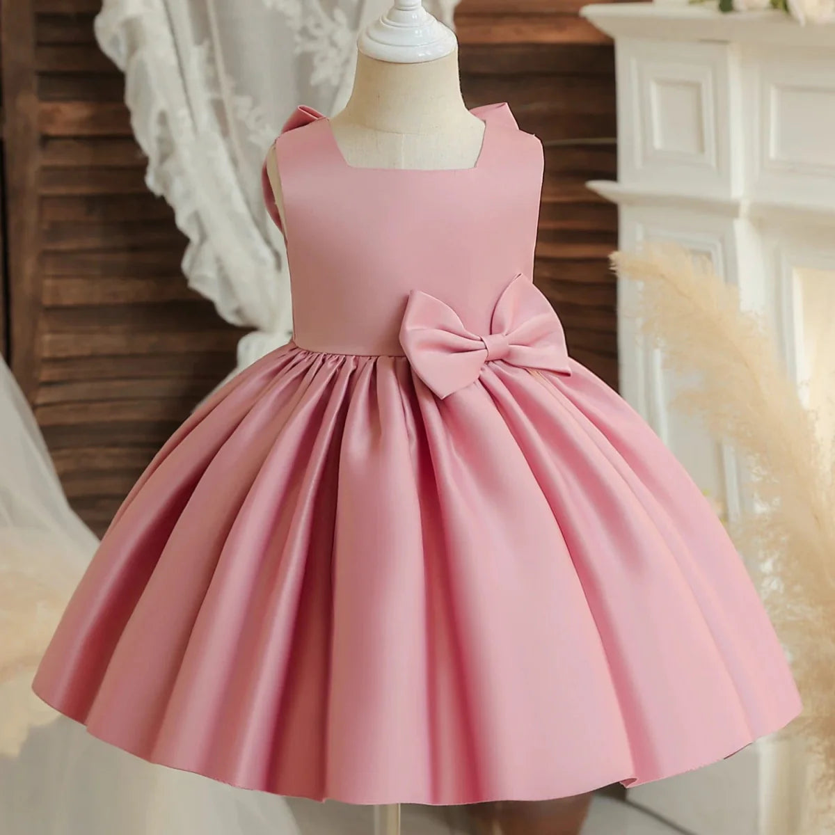 Toddler girl princess ball gown by Showlu Fashion for first communion or special occasions, sleeveless with elegant design.