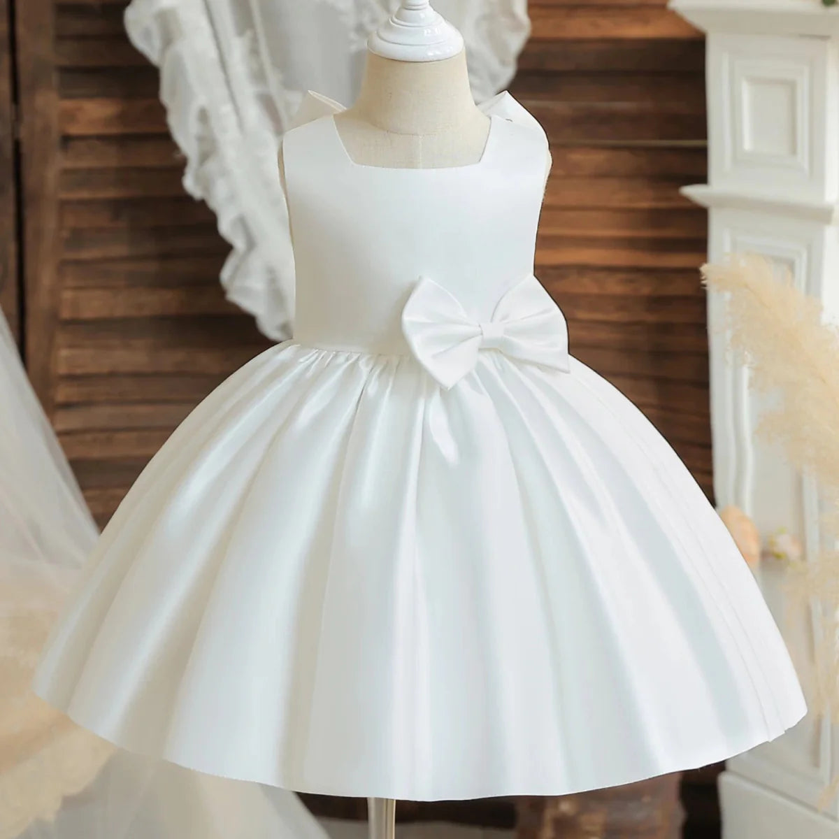 Toddler girl princess ball gown by Showlu Fashion, sleeveless, elegant for first communion, baptism, or special occasions.