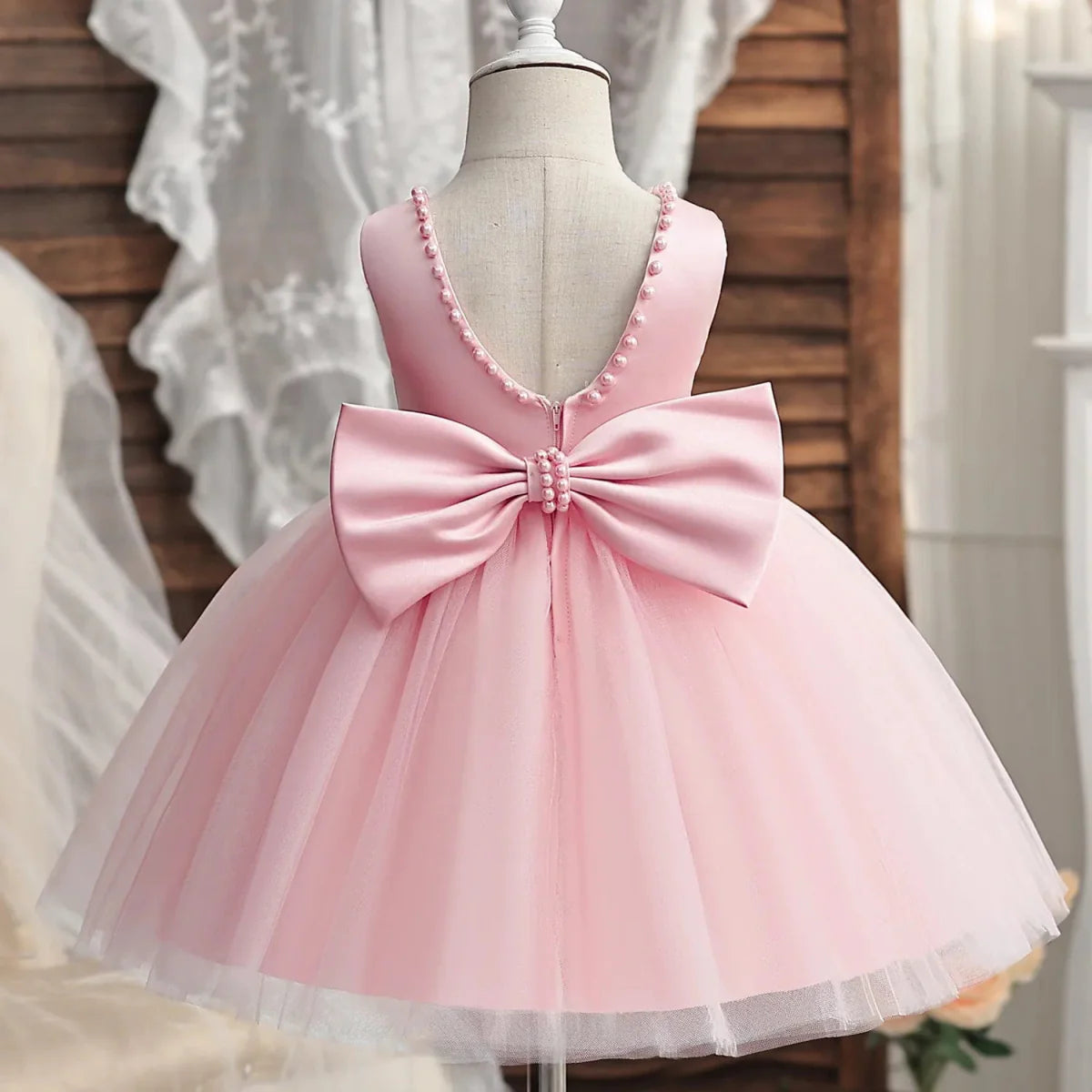 Toddler girl princess ball gown by Showlu Fashion Store, elegant sleeveless dress for first communion or special occasions.