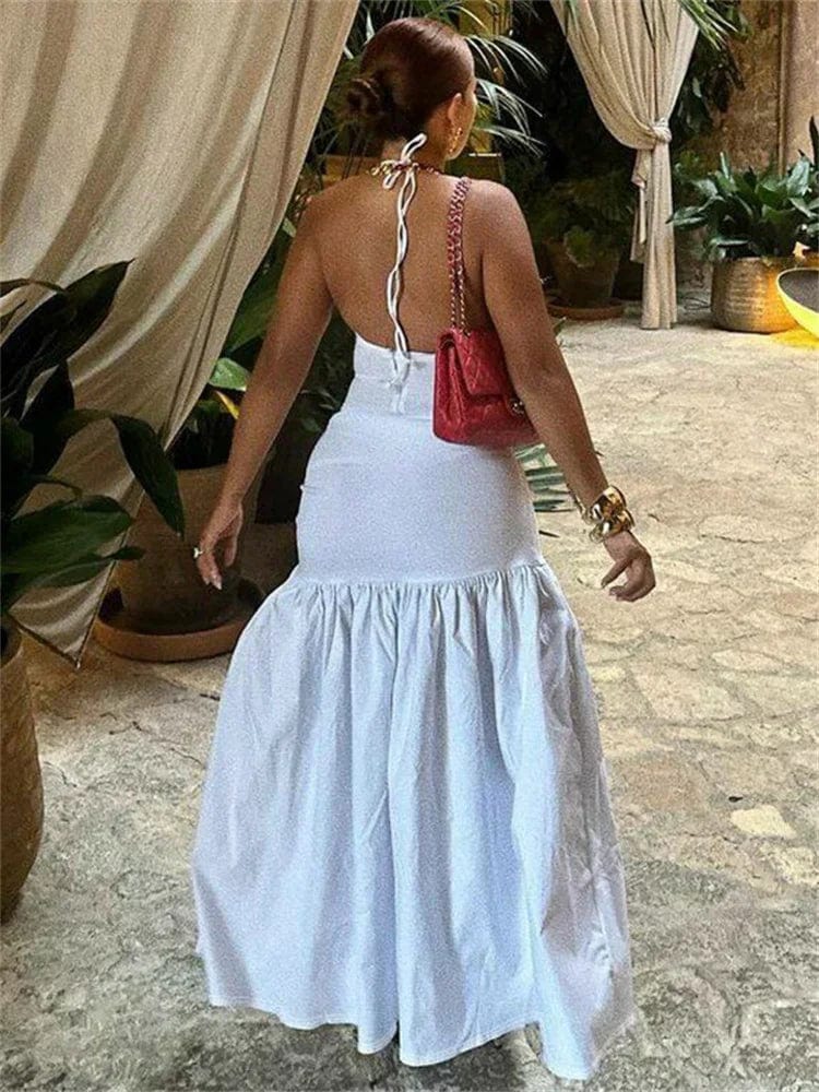 White Tossy women's 2-piece V-neck lace-up pleated skirt set, high-waist bandage style, shown on a model.