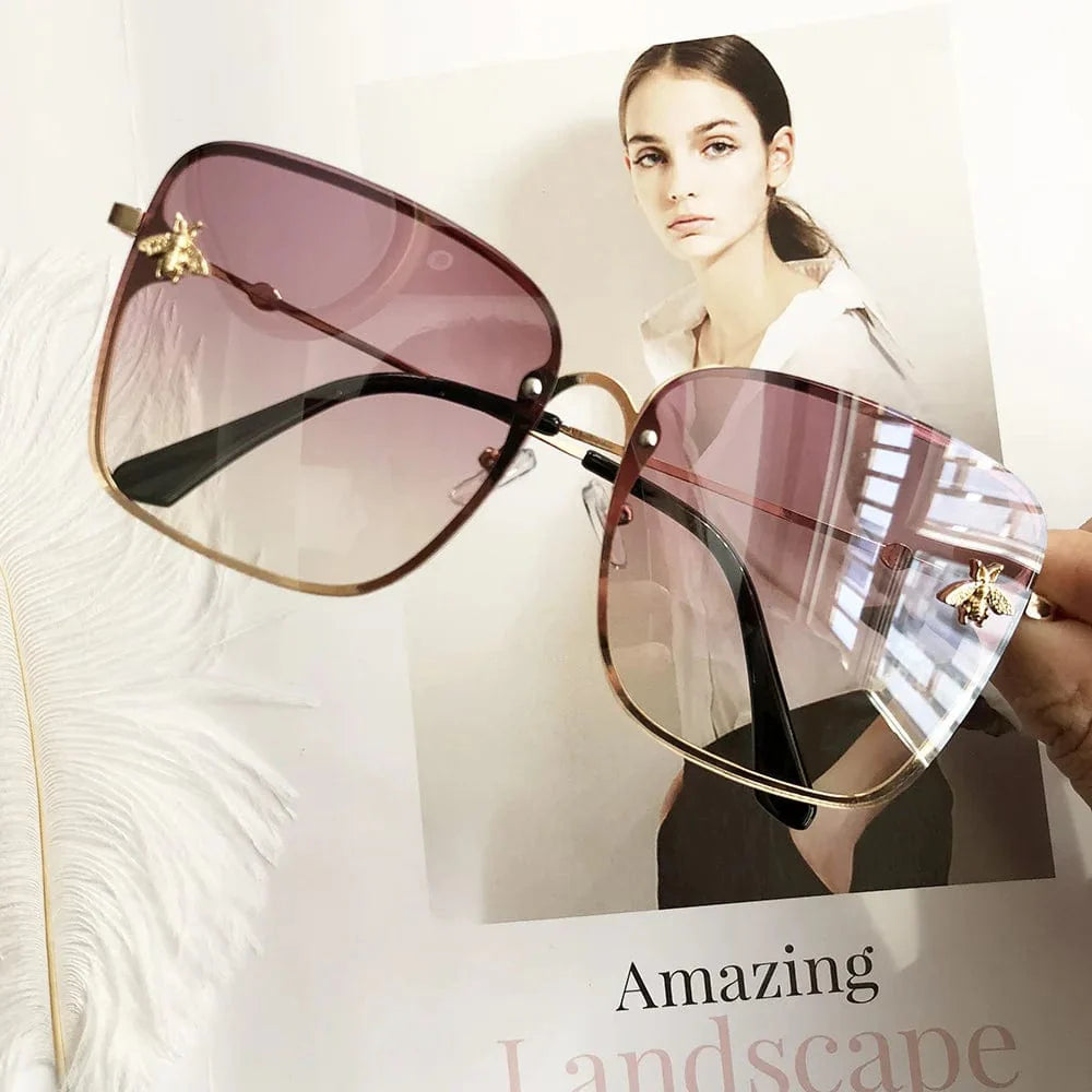 Women's oversized rimless square sunglasses with gradient lenses and UV400 protection, stylish and lightweight for women.