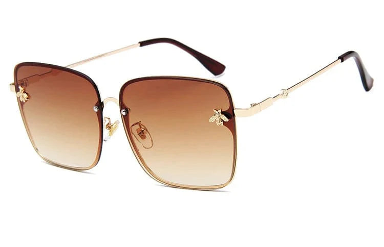 Women's oversized rimless square sunglasses with gradient lenses and UV400 protection, stylish and lightweight for women.