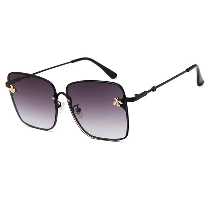 Women's oversized rimless square sunglasses with gradient lenses and UV400 protection, stylish and lightweight for women.