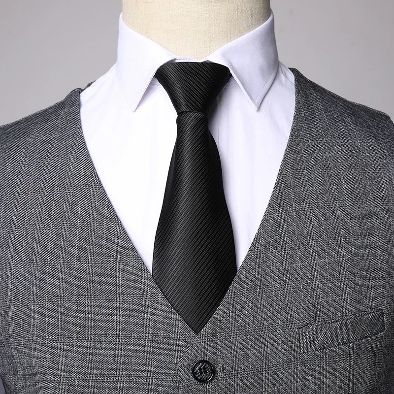 Elegant men's slim fit 3-piece suit featuring blazer, vest, and pants, perfect for business, formal events, or weddings.