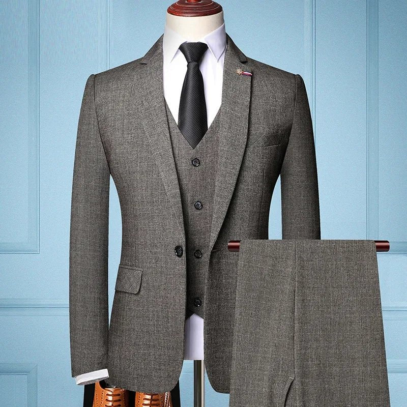 Elegant men's slim fit 3-piece suit with blazer, vest, and pants for business or formal occasions, by SHOWLU FASHION STORE.