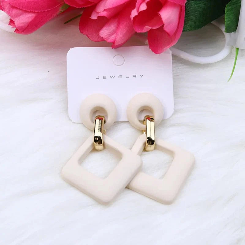 Showlu Fashion acrylic dangle earrings featuring blue, white, and pink geometric hollow square designs for women and girls.