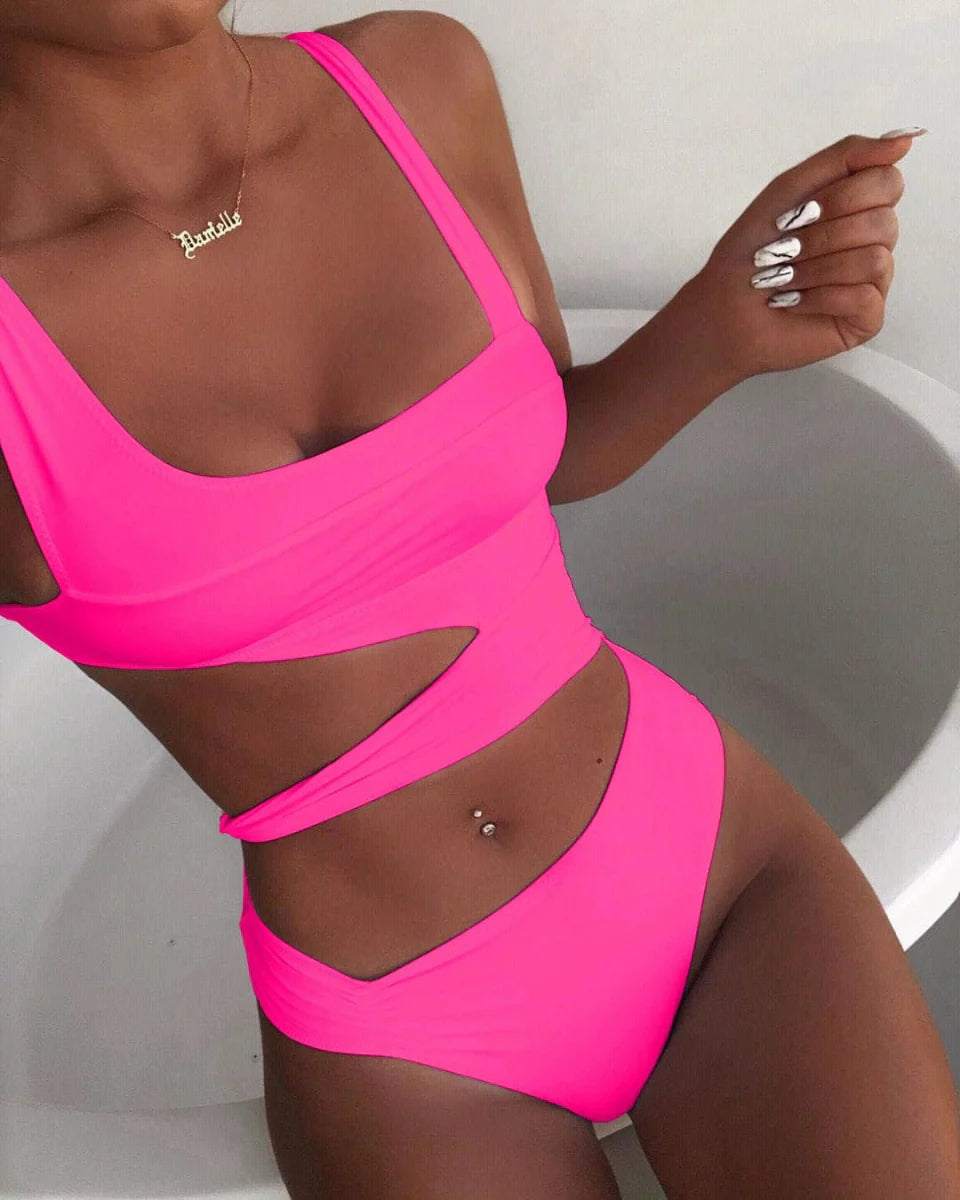 Showlu Fashion Women's hollow-out one-piece swimsuit with triangle nylon chest pad, solid color, spaghetti straps, perfect for summer beach.