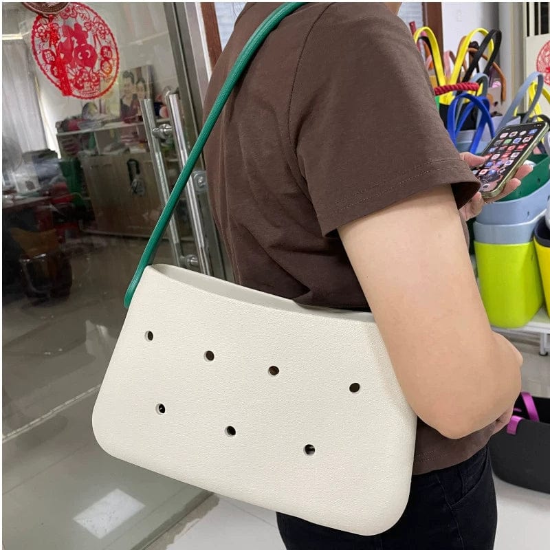 Feral Cat Women's silicone underarm bag in candy color, small satchel style with a single strap, suitable for travel and casual use.