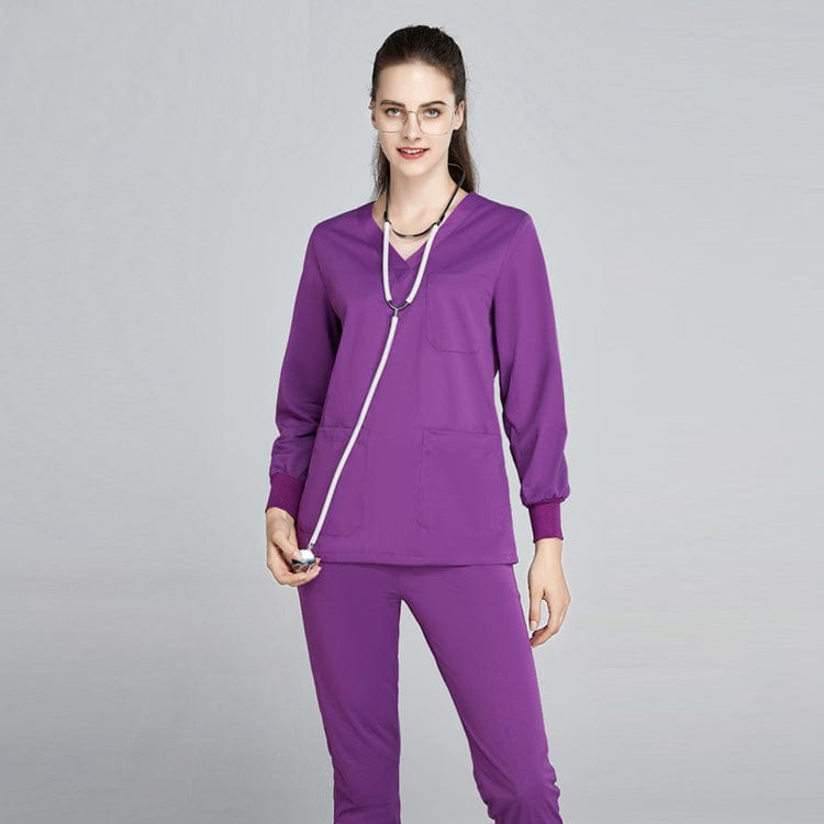 Unisex Showlu jogger scrub suit set with V-neck design, ideal for medical professionals in hospital or nursing settings.