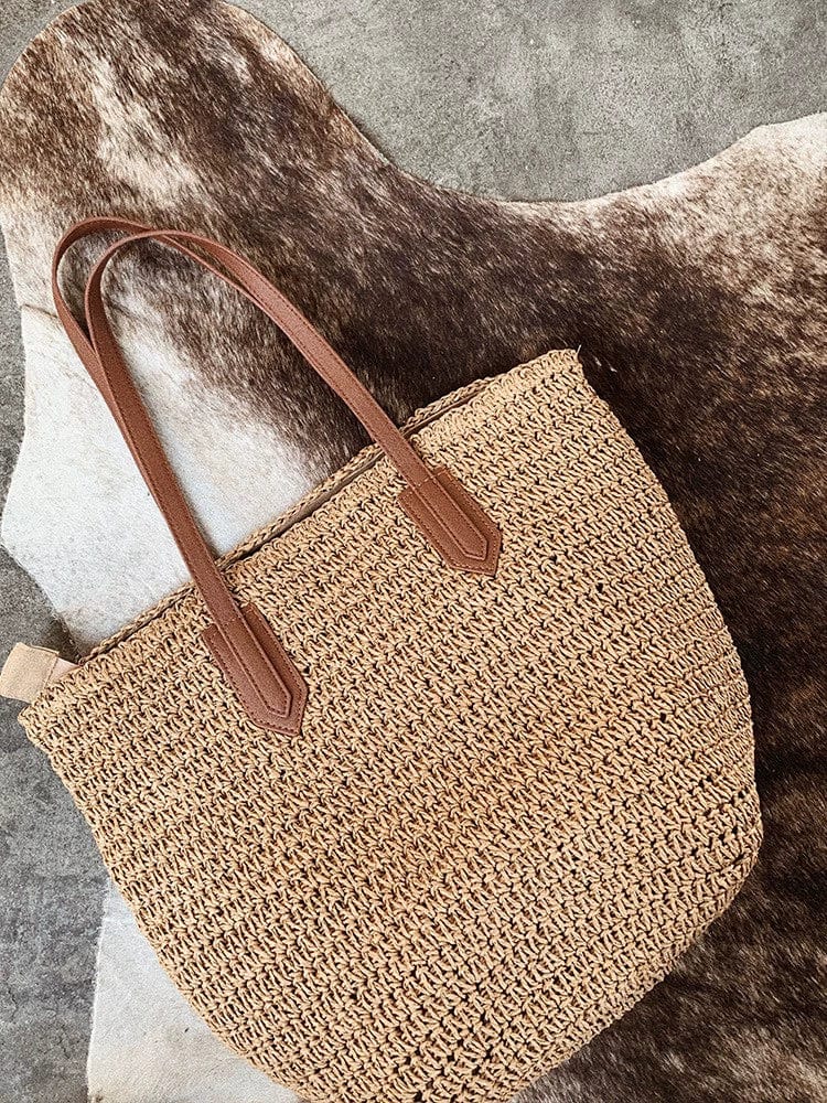 Showlu Fashion straw shoulder bag with woven pillow style design, perfect for seaside vacations and casual summer outings.