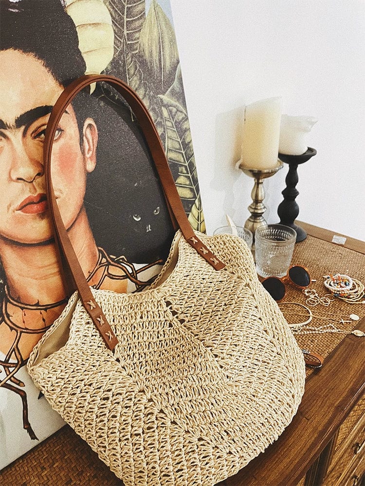 Straw shoulder bag by Showlu Fashion Store featuring woven pillow design, perfect for vacation and seaside outings.