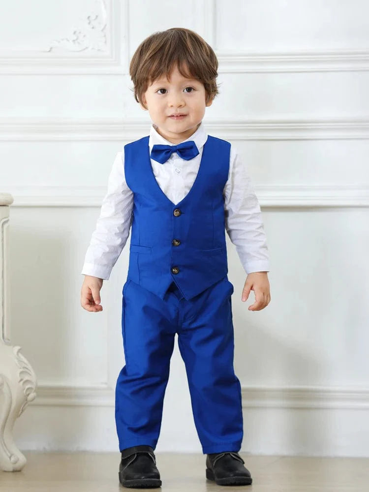 Navy blue boys' tuxedo suit with vest, bowtie, shirt, and pants, perfect for a wedding or formal occasion.