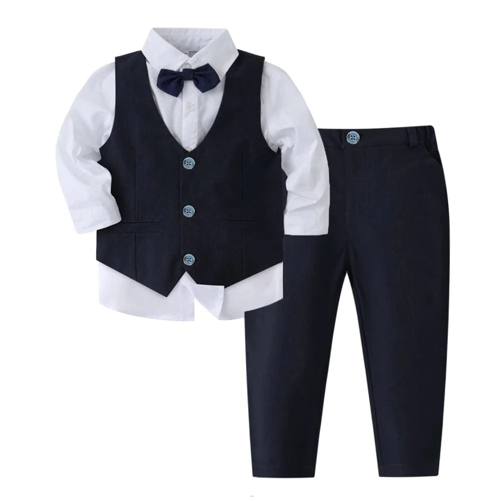 Boy's navy blue tuxedo suit with vest, bowtie, and shirt, perfect for wedding or formal occasions, by Showlu Fashion Store.